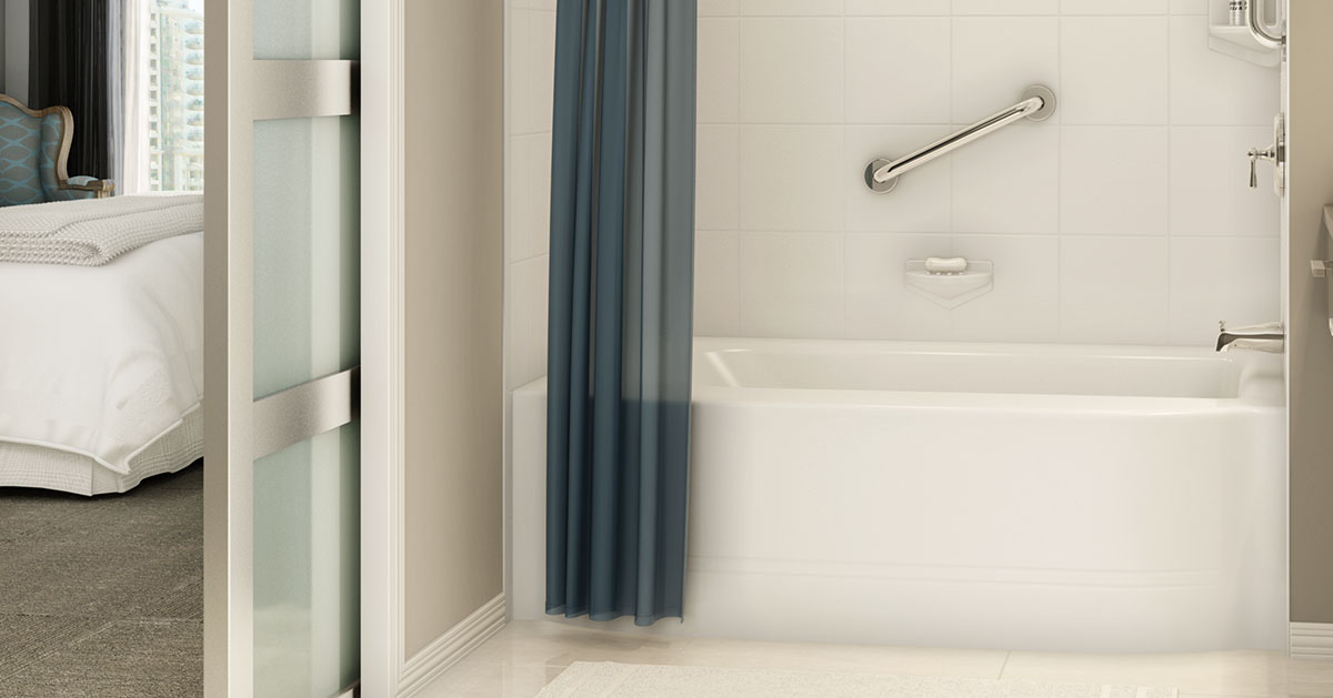 bathtub with blue shower curtain